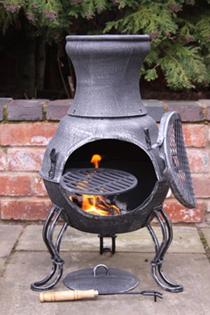 Billie Cast Iron Chiminea, Stone Grey, in use