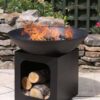 Isla Fire Pit with fire in garden